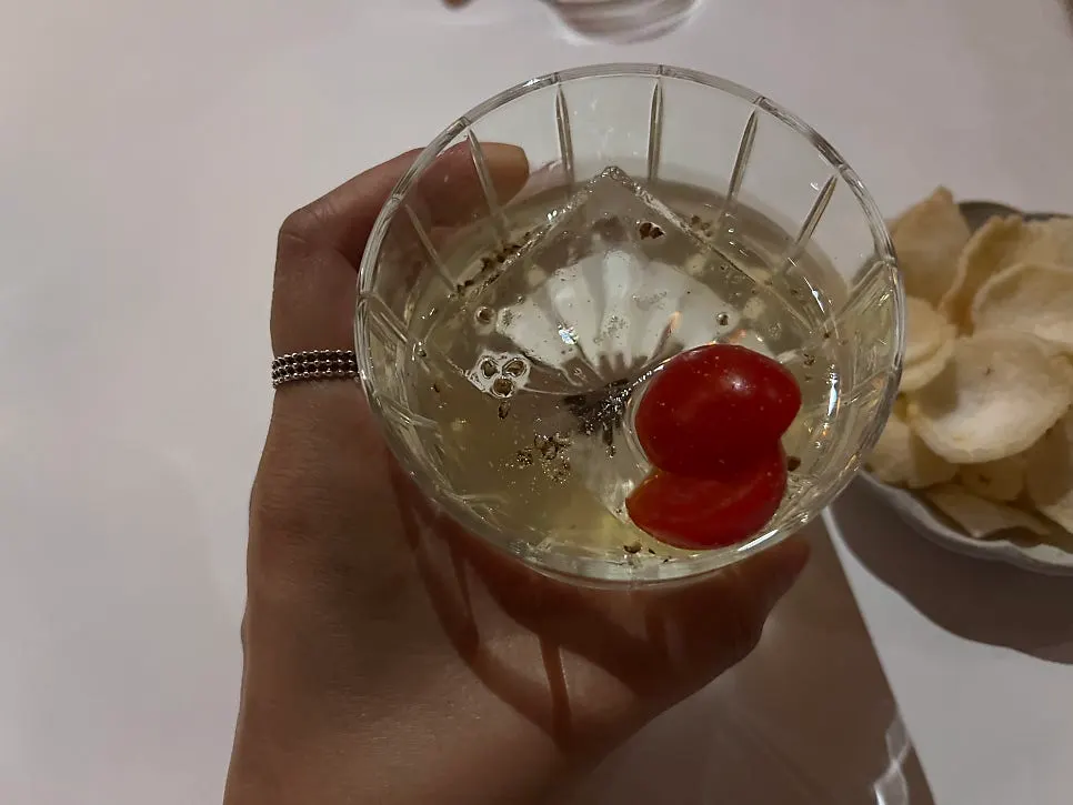 Signature cocktail Tomato of That Time topped with a tomato at Gak Seoul