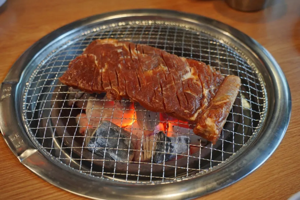King-size pork ribs on the charcoal grill
