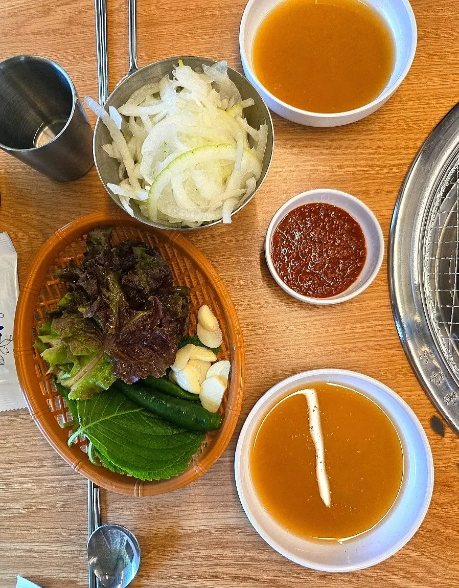 Plate of flatfish salad and other basic side dishes