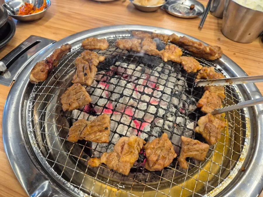 Marinated ribs cooking on the charcoal grill