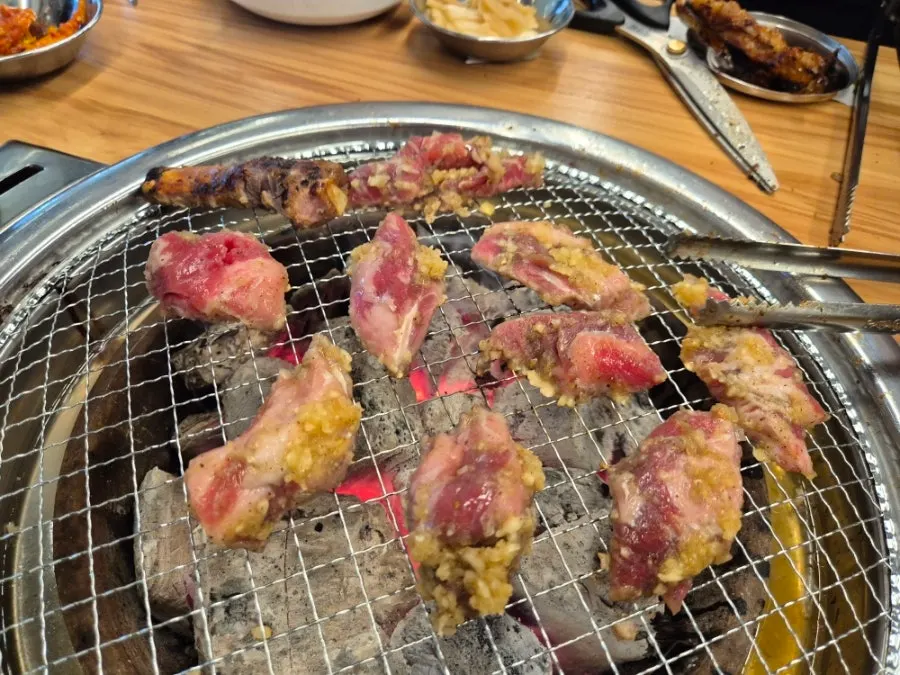 Garlic-marinated beef ribs grilled over charcoal