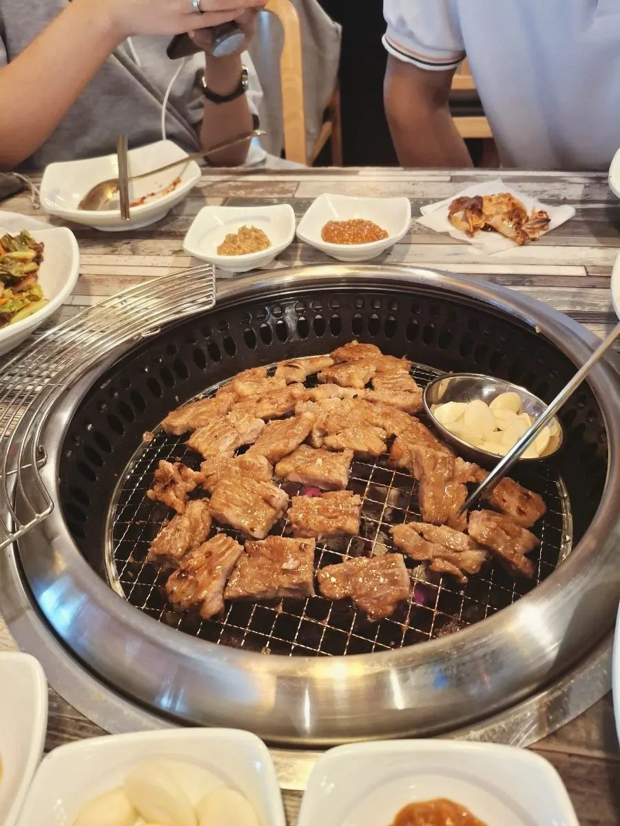Marinated ribs cooking to perfection over charcoal