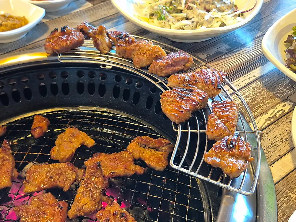 Close-up of golden-brown grilled pork ribs