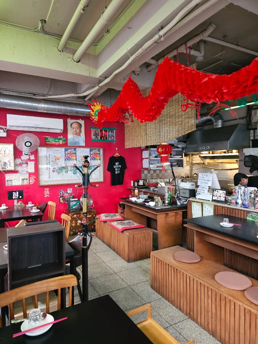 Yongju interior with a dragon sculpture on the ceiling