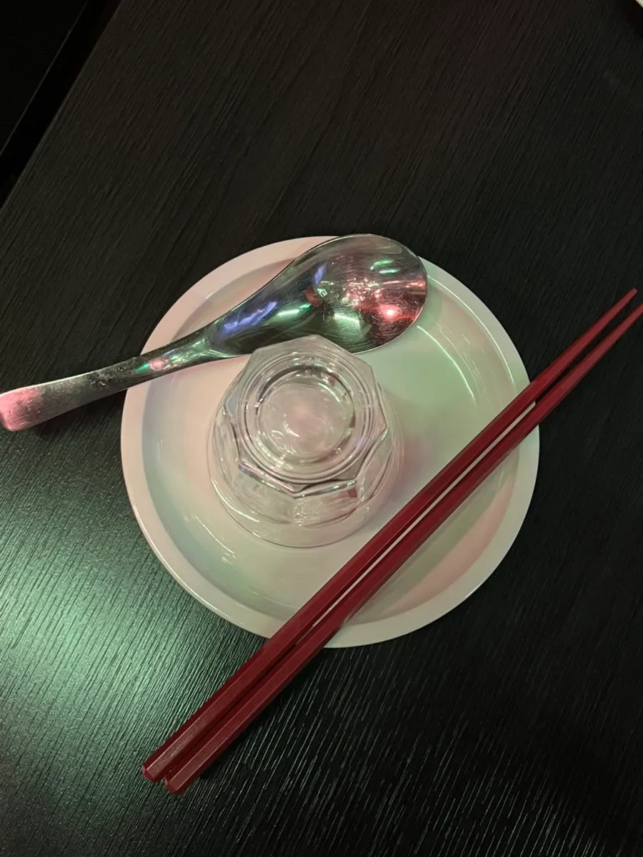 Table at Yongju set with Chinese dishes and drinks