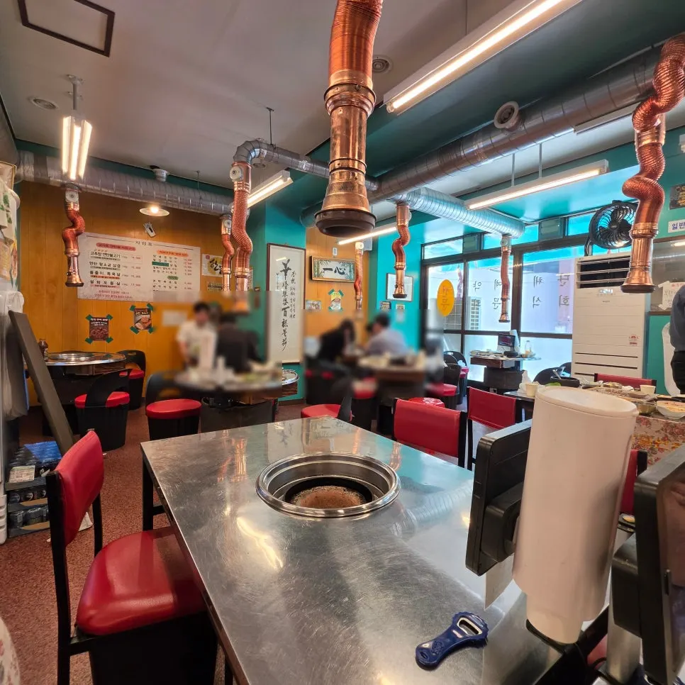 Interior of Galgol Yeontanjip with customers eating during lunch hour