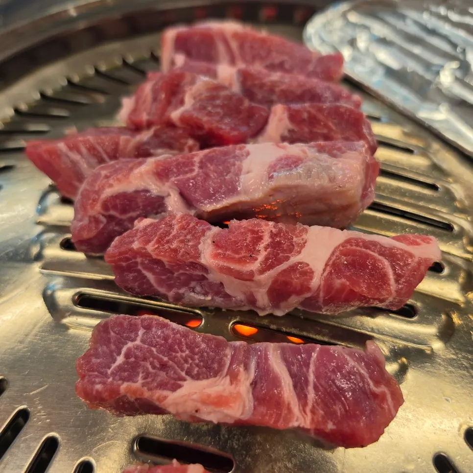 Special pork neck placed on the charcoal grill