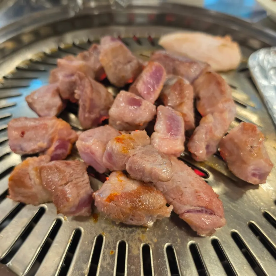 Pork neck partially grilled