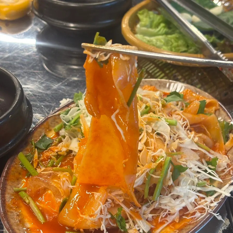 A bowl of the signature flat bibim noodles