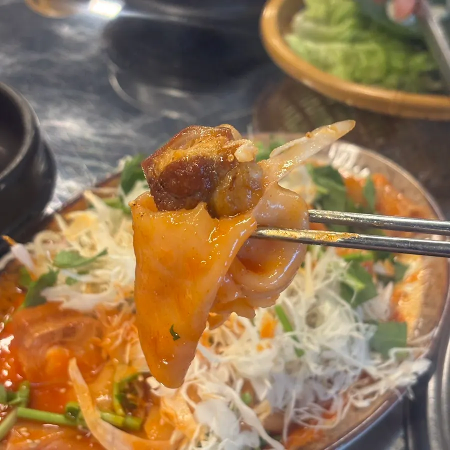 Close-up of the springy flat bibim noodle strands