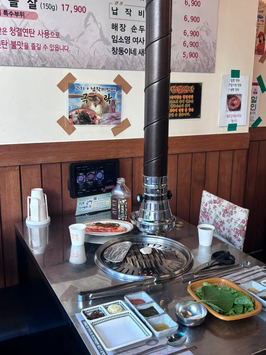 Seating area with group tables at Gamgol Yeontanjip