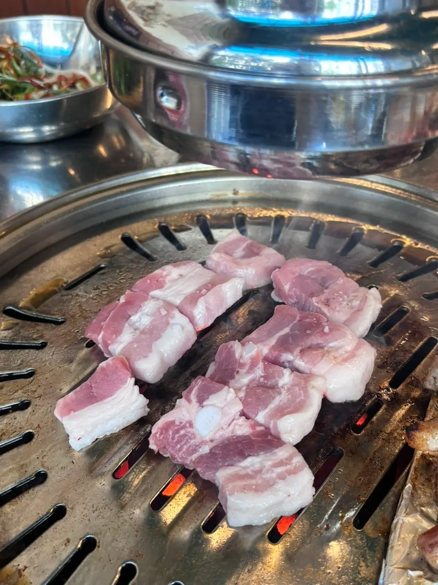 Wang-sogeum pork belly sizzling on the charcoal grill