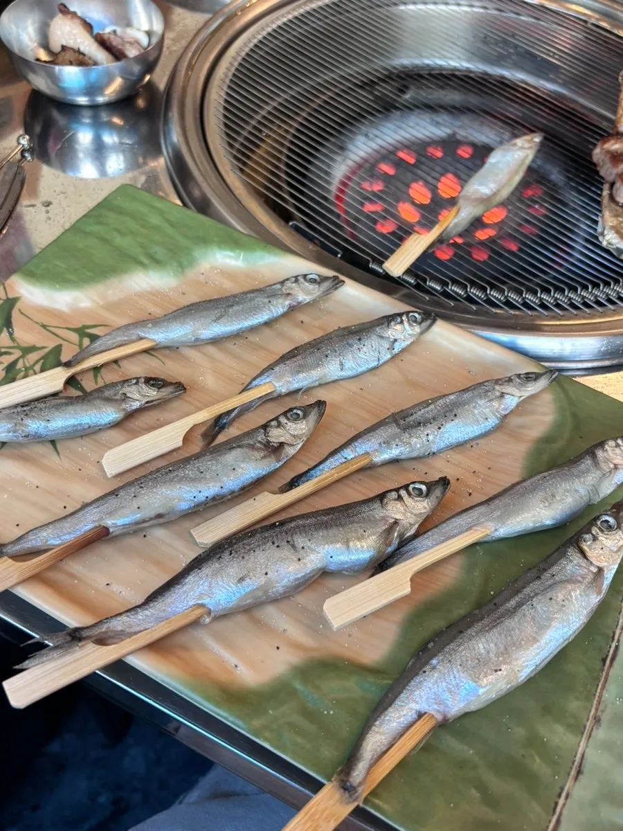 Grilled capelin with roe on skewers