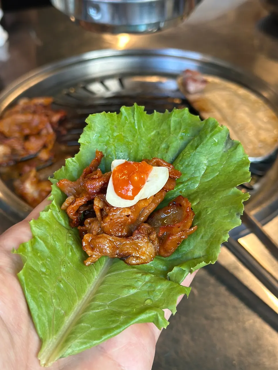 A fully cooked piece of gochujang charcoal bulgogi