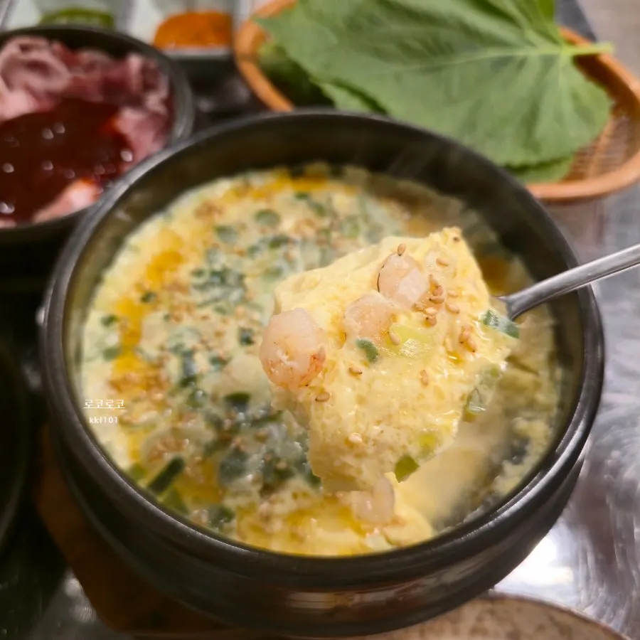 Inside of the egg custard with shrimp and scallions