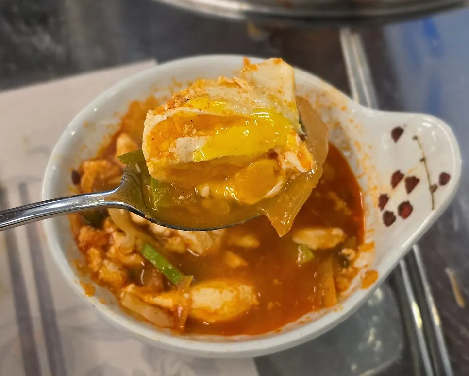 Hangover sundubu-jjigae with crab and clams