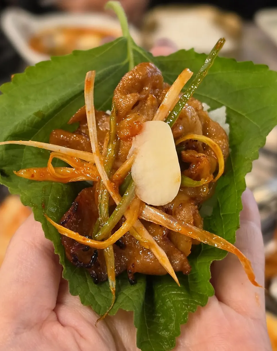 Charcoal bulgogi eaten with sweet potato salad