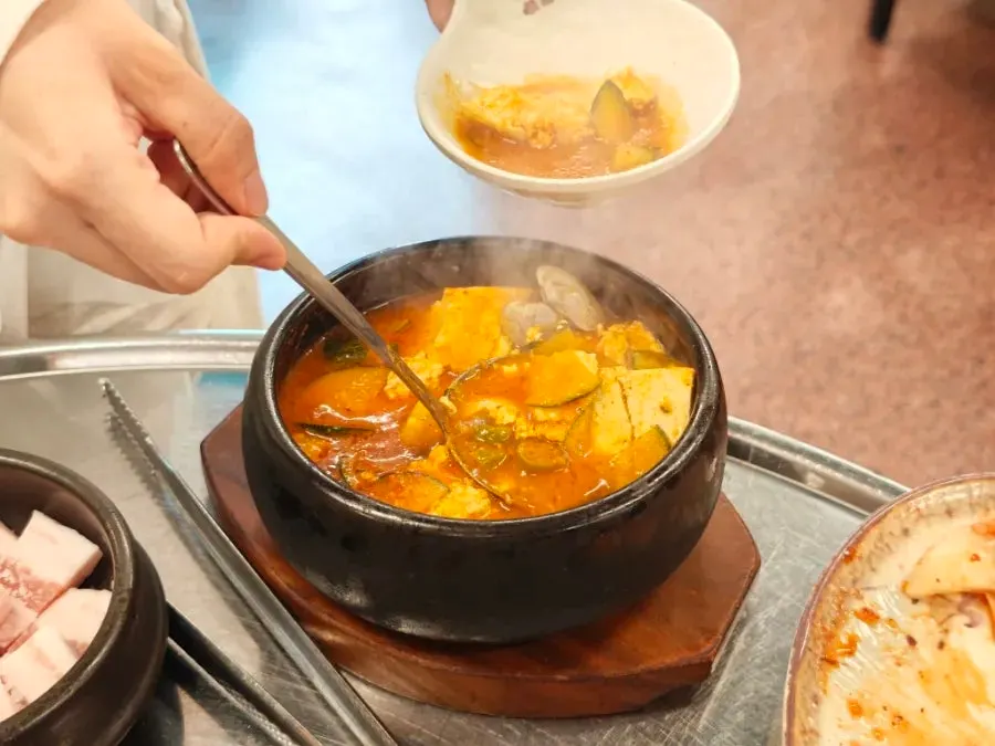 Steamed egg served alongside the meal
