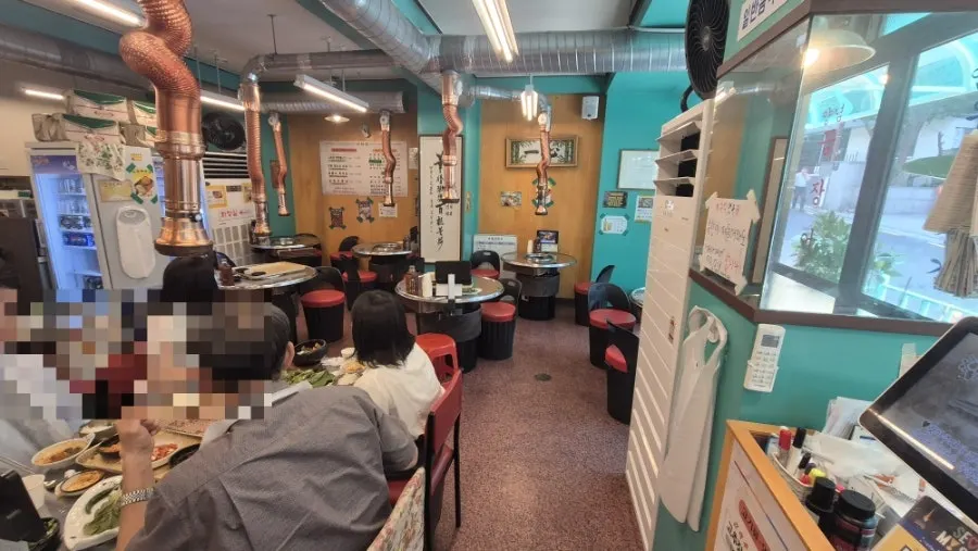 Store interior with generously spaced tables