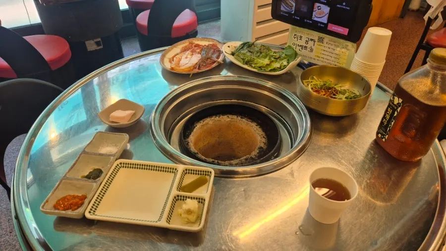 Full spread of ordered meat and standard side dishes