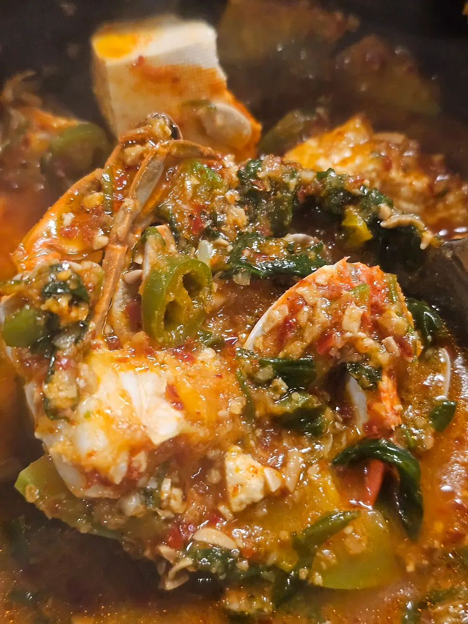 Doenjang jjigae broth with crab and clams