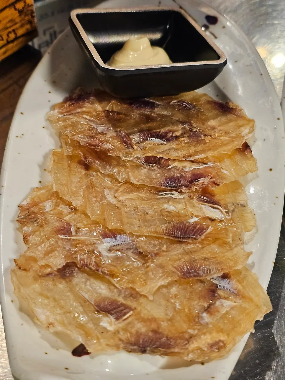 Grilled dried filefish snacks with mayonnaise from the review event