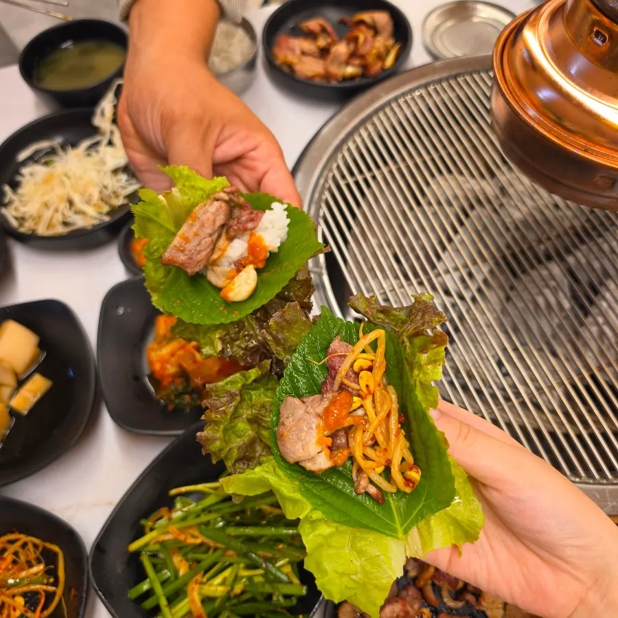 Duck meat and chive salad wrapped in lettuce