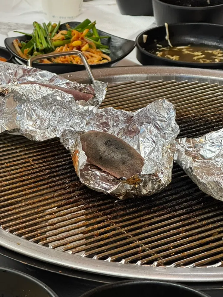 Duck meat and pickled radish wrapped in a perilla leaf