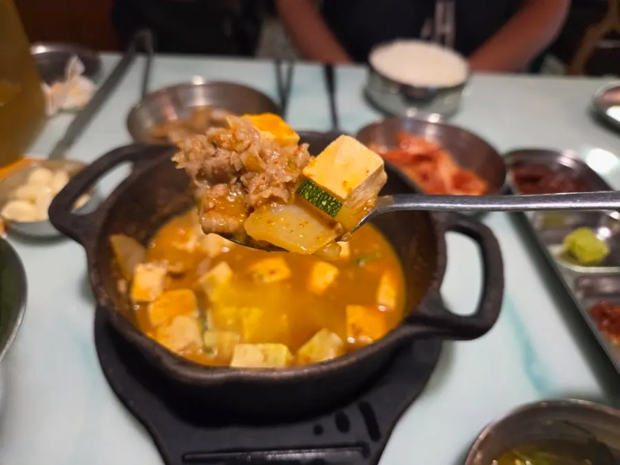 Beef soybean stew served with a bowl of rice