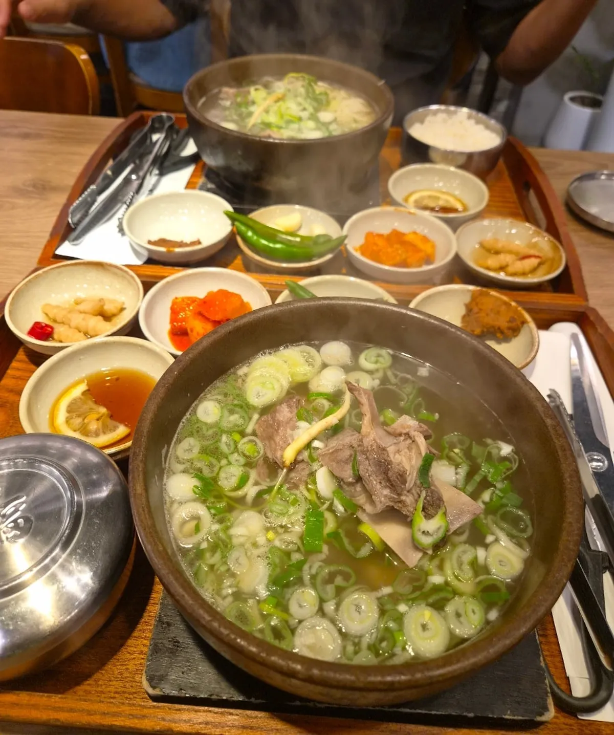 A full spread of galbitang at Gang Galbitang Seomyeon