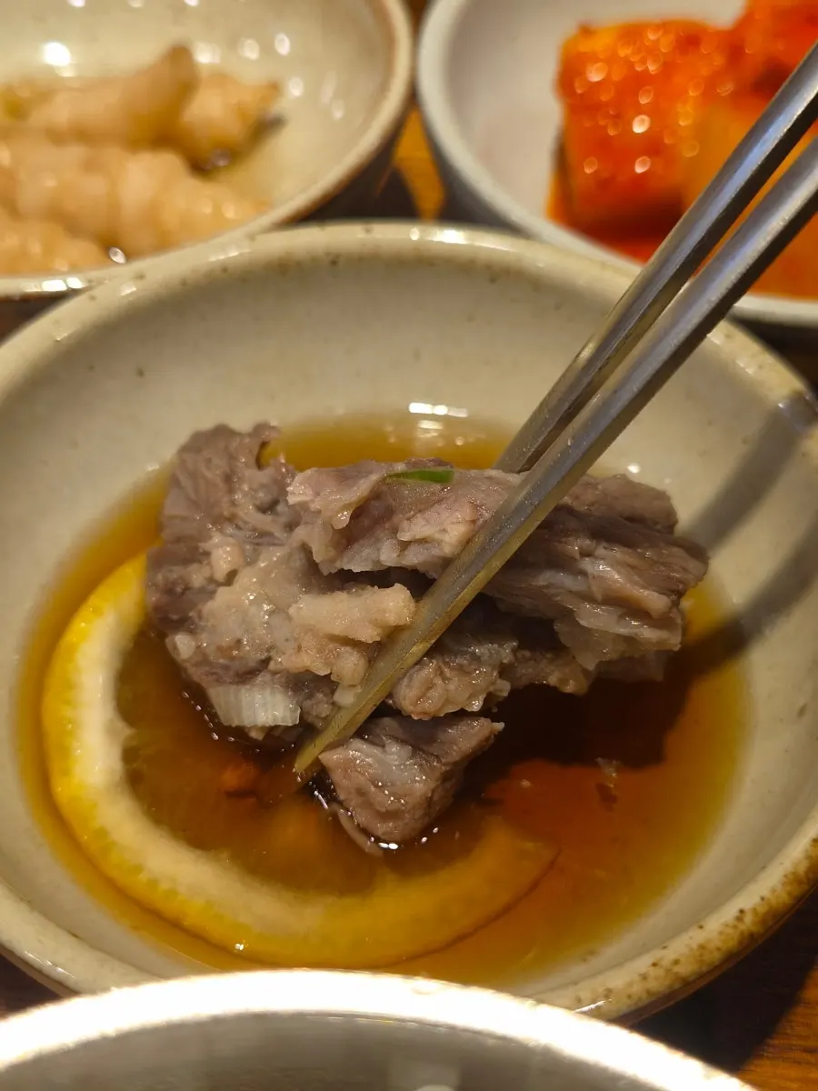 Tender rib meat pulling apart along the grain