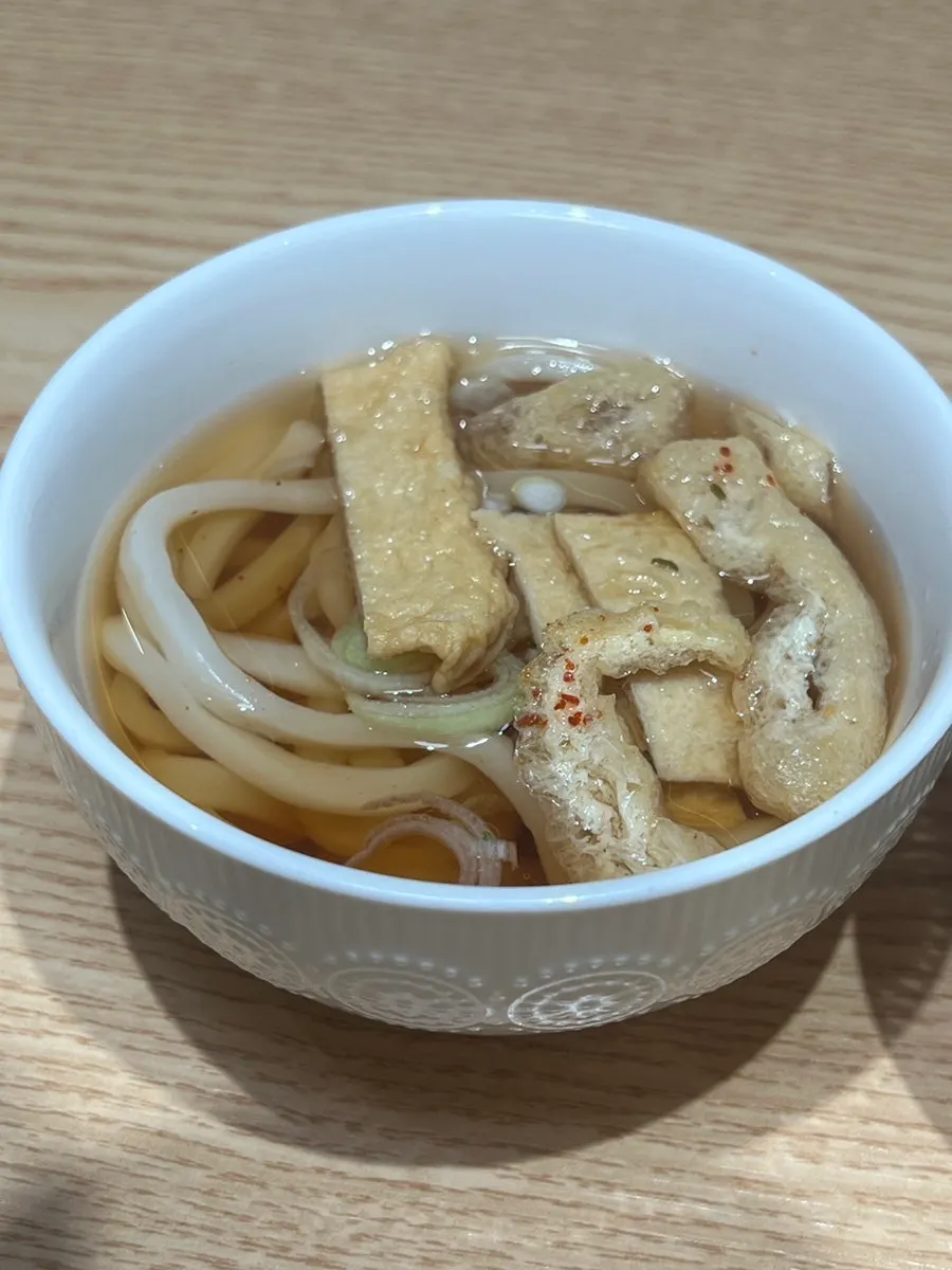 Complimentary bowl of mini udon