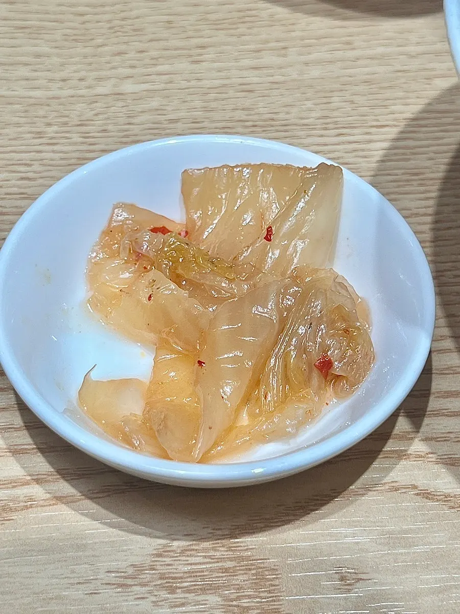 Full spread of Ganghan Sushi's complimentary side items