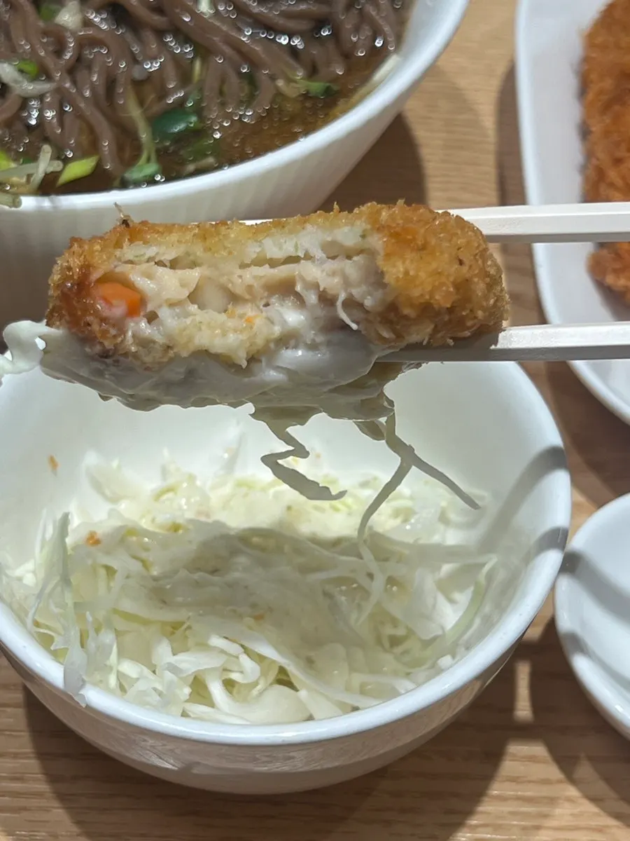 Cross-section of the seafood croquette cut in half