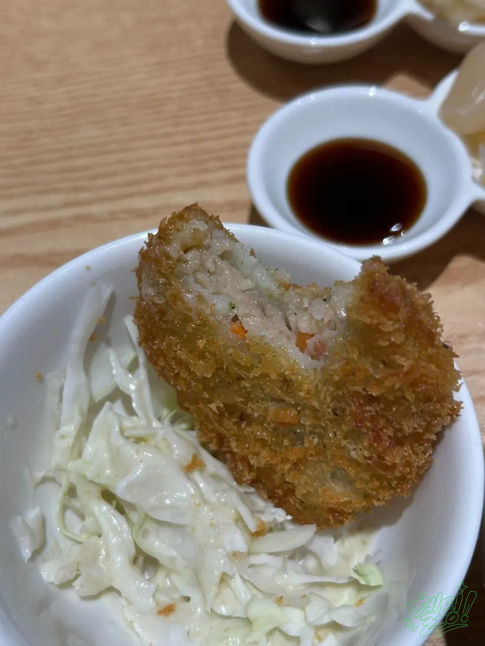A mini bowl of rich udon broth