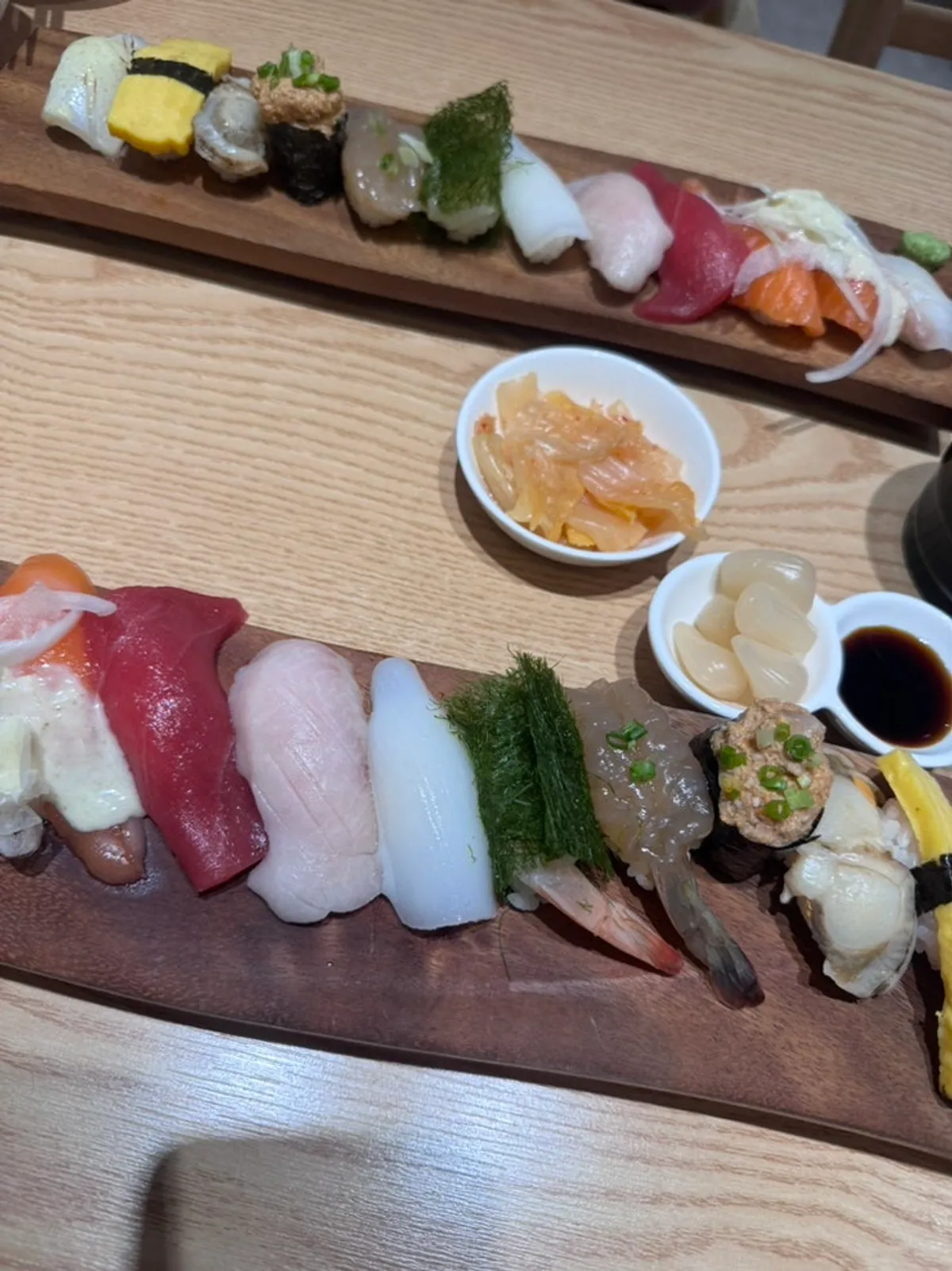 Close-up of flounder and salmon sushi with thick slices on top