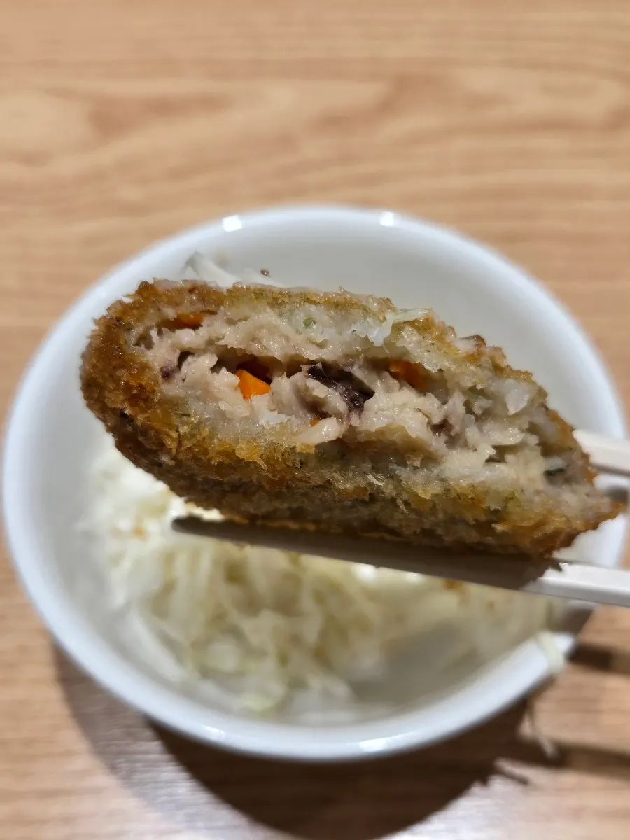 Plate of crispy-outside, tender-inside seafood croquette