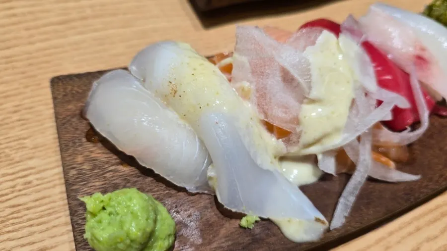 The full 12-piece Ganghan Sushi set laid out on the table