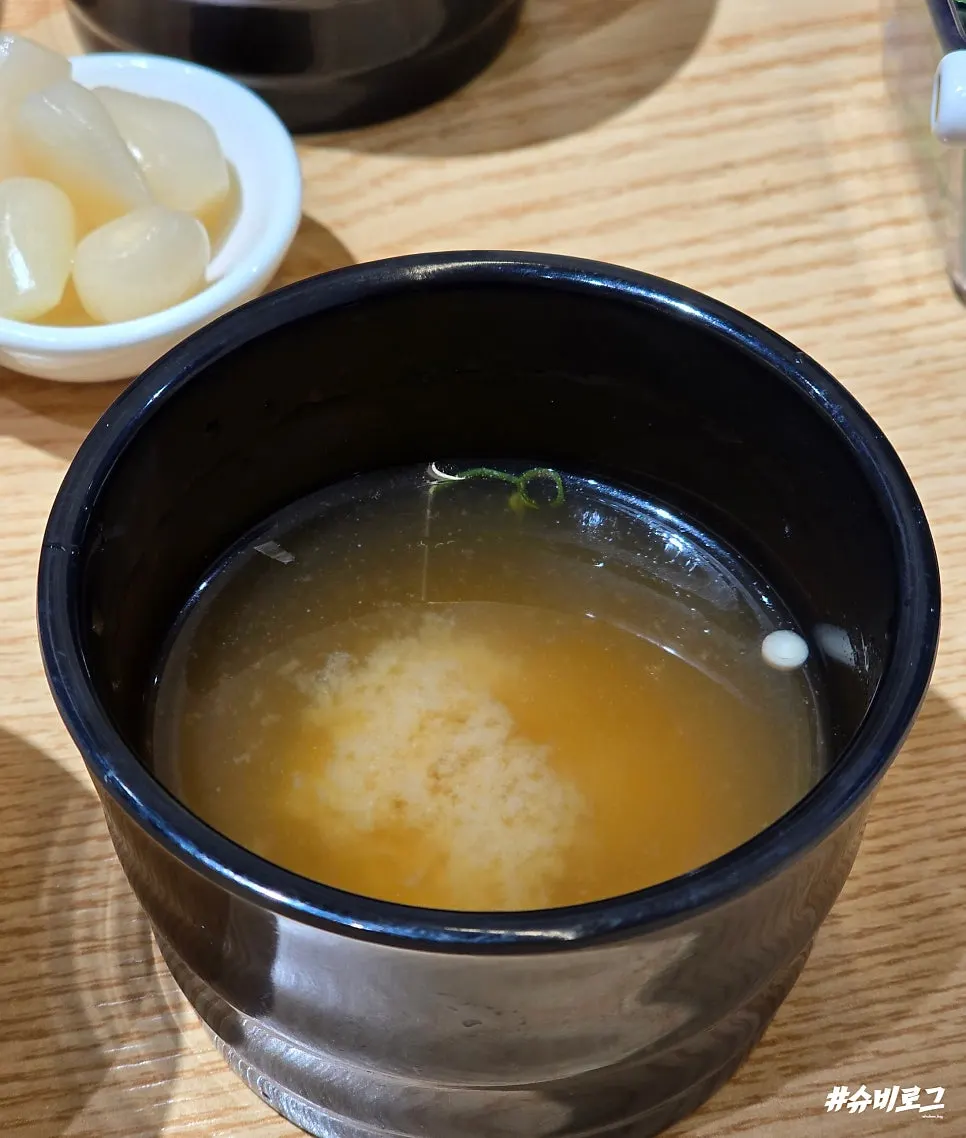 Free seafood croquette, miso soup, and udon served as sides