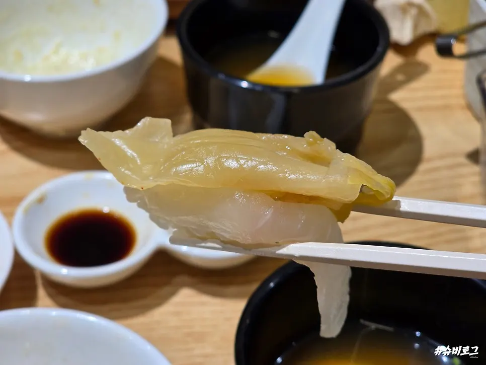 Wasabi and washed aged kimchi served on the side
