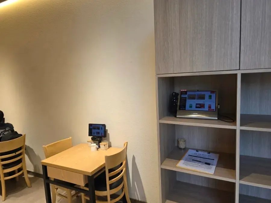 Wood-toned interior of Ganghan Sushi