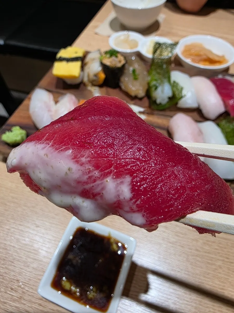 Close-up of sushi with thick cuts of fish