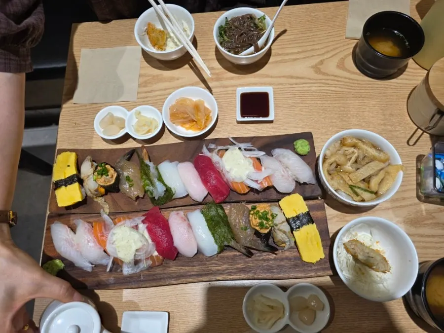 Sushi spread with wasabi and soy sauce on the side