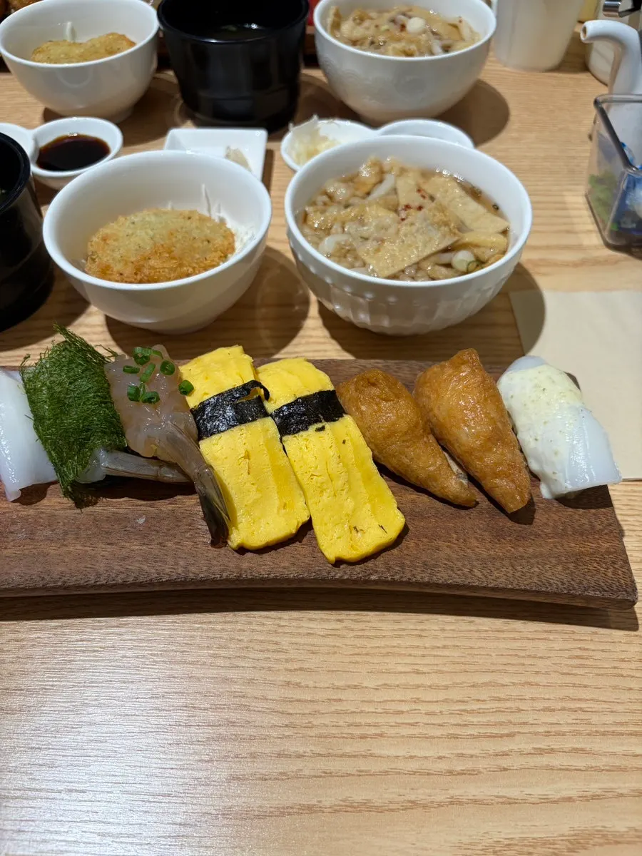 Plate of Ganghan Sushi 12P with flounder, tuna, and salmon