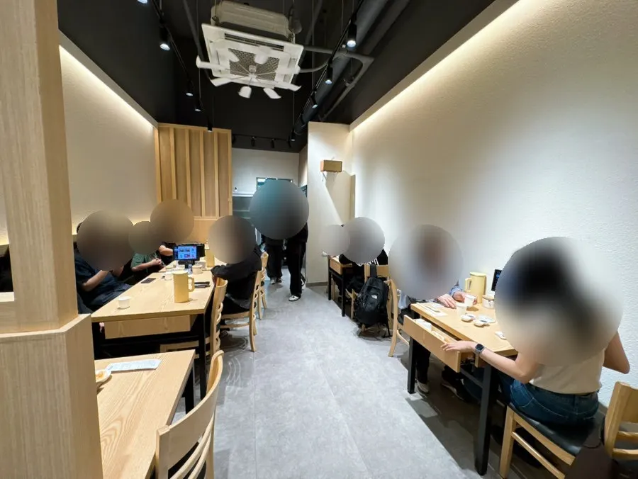 Bright, clean interior seating at Ganghan Sushi Cheonan Buldang Branch