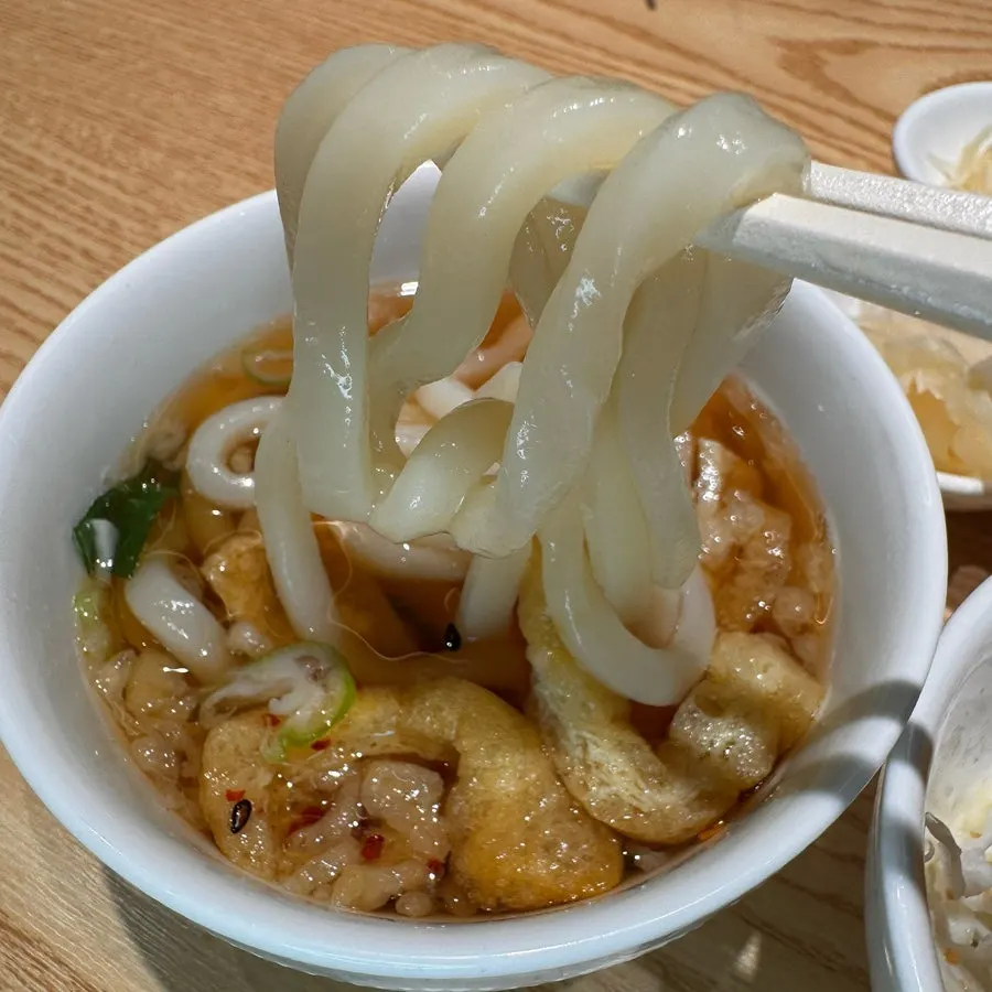 A bowl of chewy mini udon