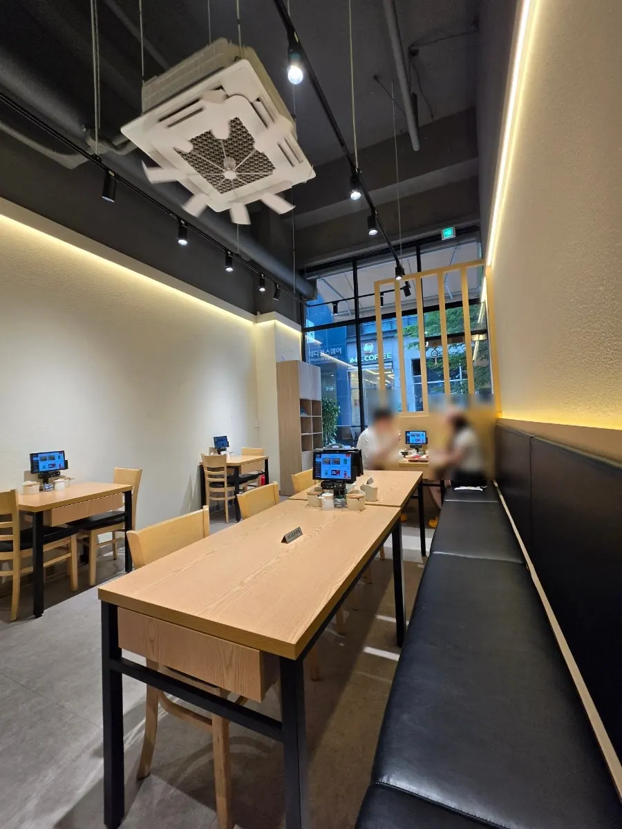 Long row of tables inside the restaurant
