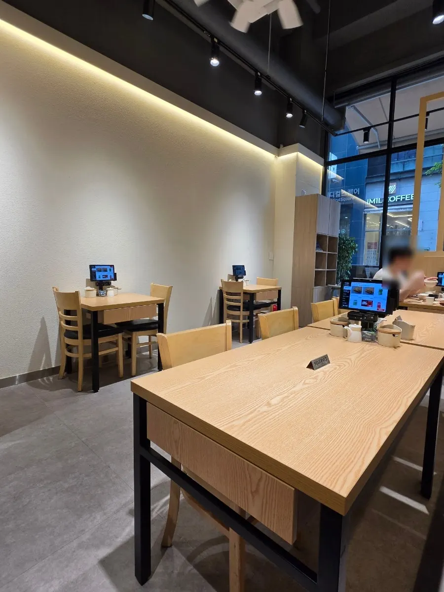 Bright, clean seating inside the sushi restaurant