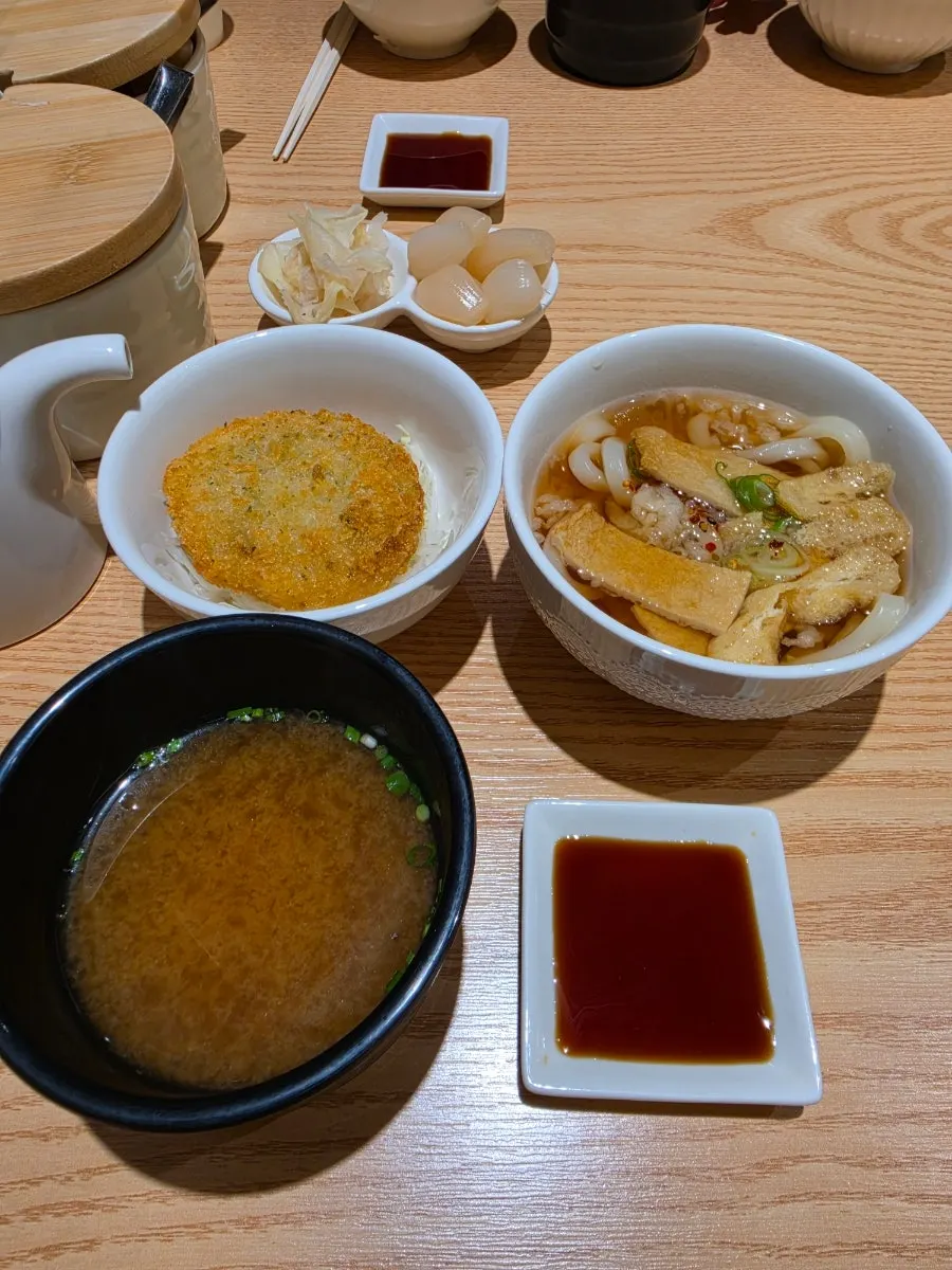 Udon and seafood croquette served alongside the sushi