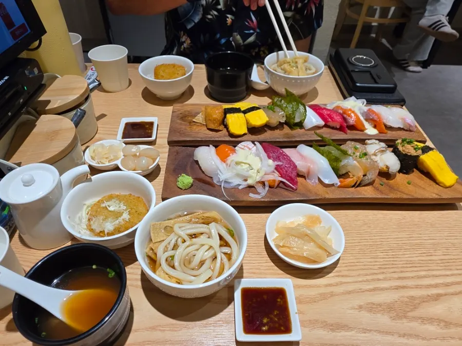 Both sushi sets placed side by side on the table